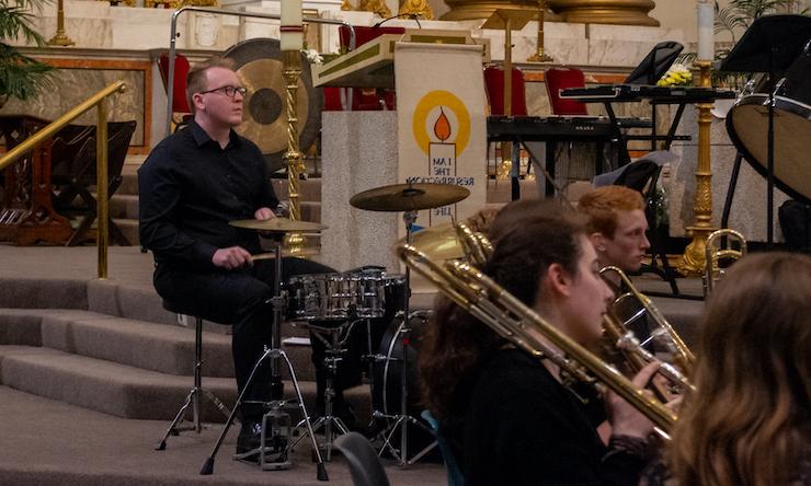 matt playing drums at church